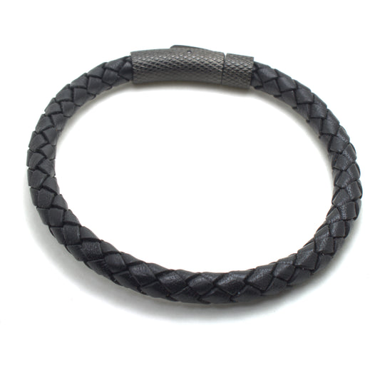 A black braided bracelet crafted from genuine leather, featuring a black-tone textured stainless steel bayonet clasp.