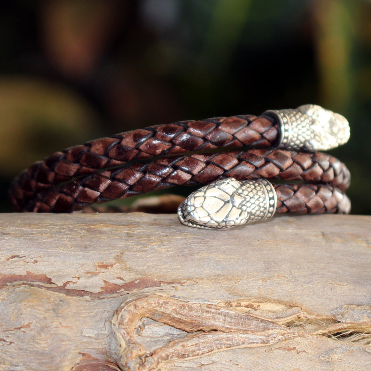 Braided Leather Bracelet with Twin Snake Heads – Handcrafted Symbol of Transformation