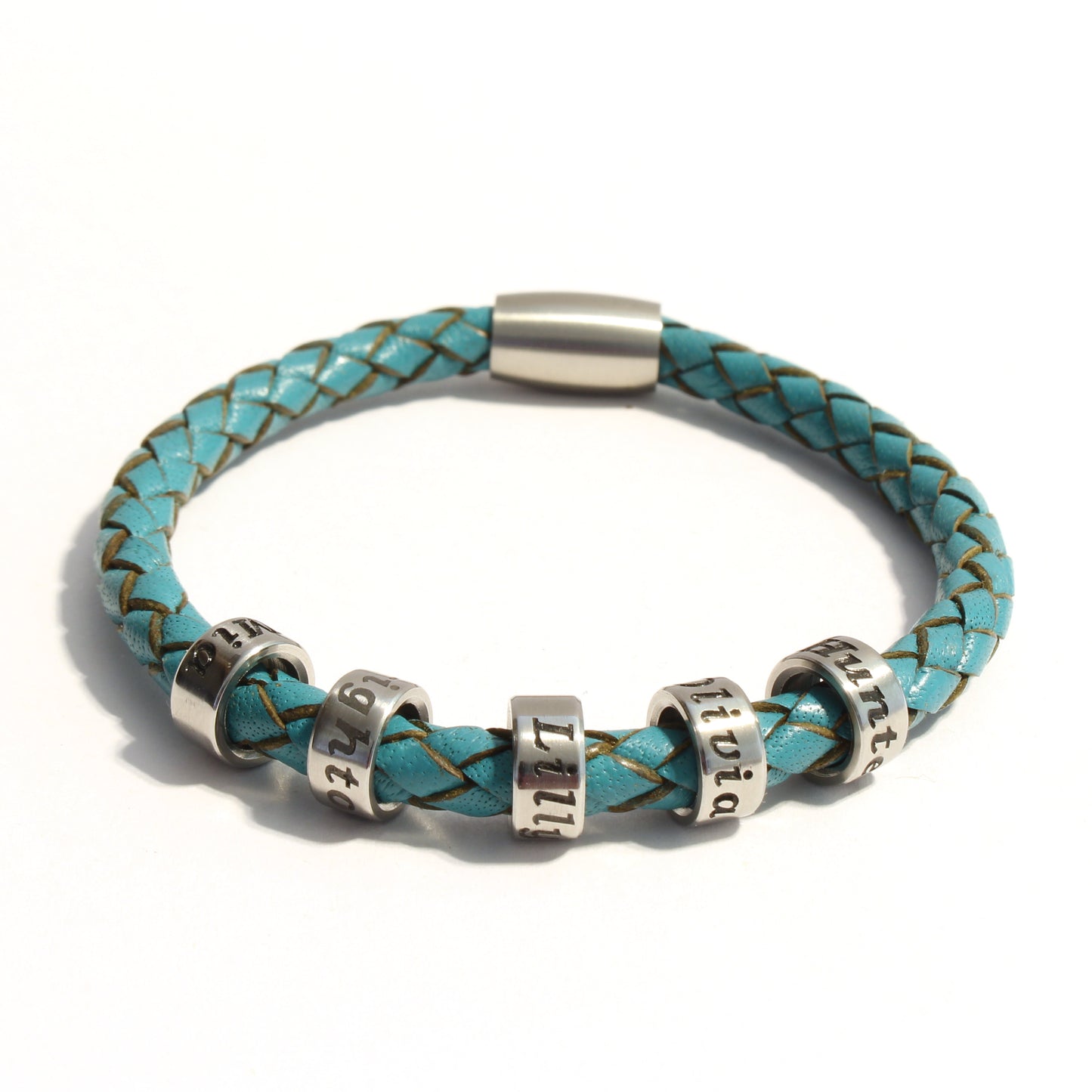Turquoise braided leather bracelet with 5 stainless steel beads on a white background