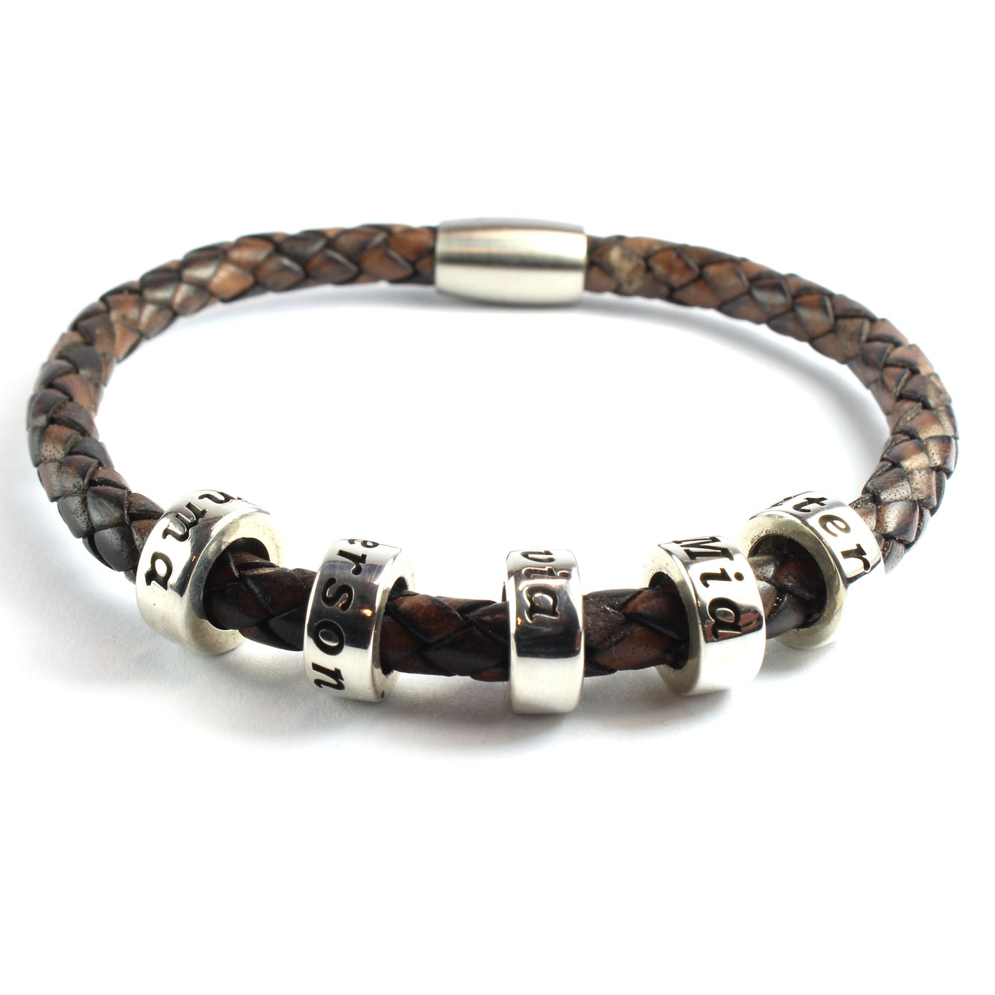 An antique brown genuine leather braided bracelet with 5 personalized sterling silver beads, on a white background