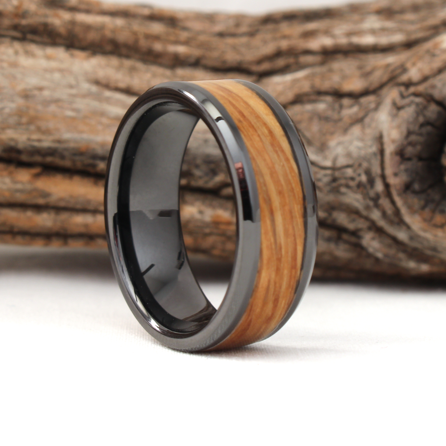 Black Ceramic Ring with Whiskey Barrel Wood Inlay Face Grain