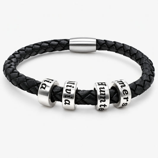 Black leather bracelet with 4 personalized beads, on a white background