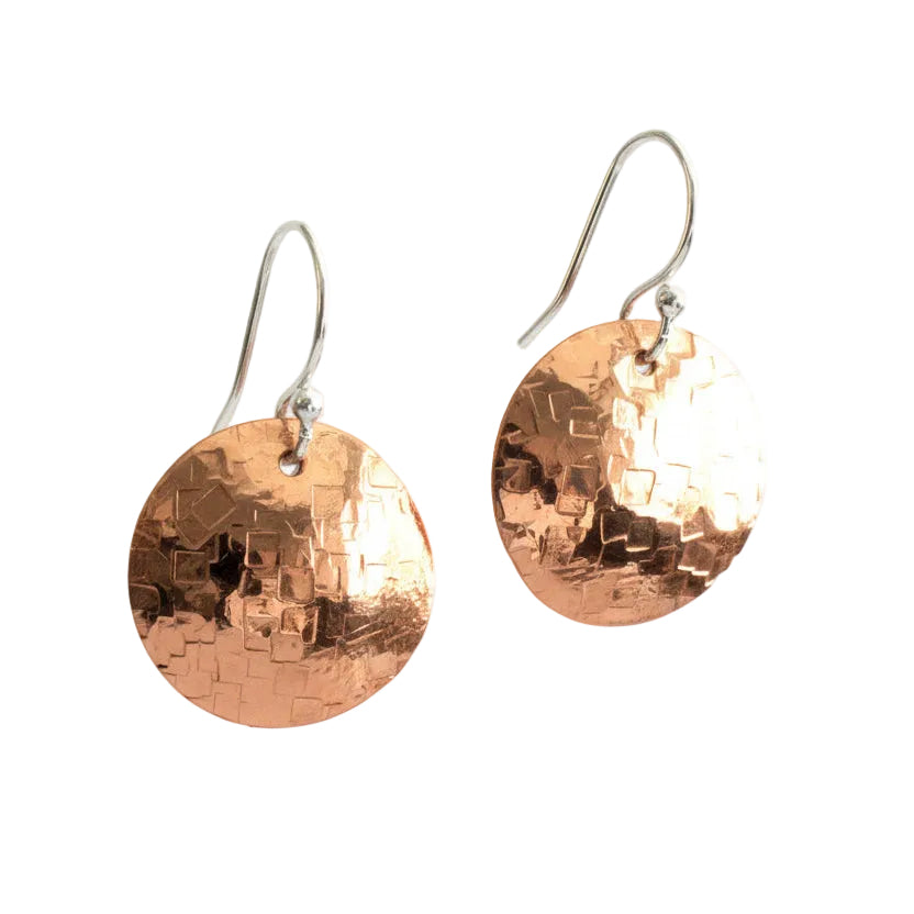 Copper Disc earrings against a white background