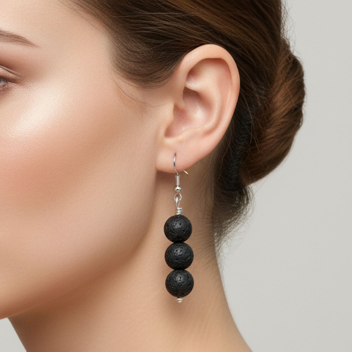 Model wearing Lava Rock Bead Earrings