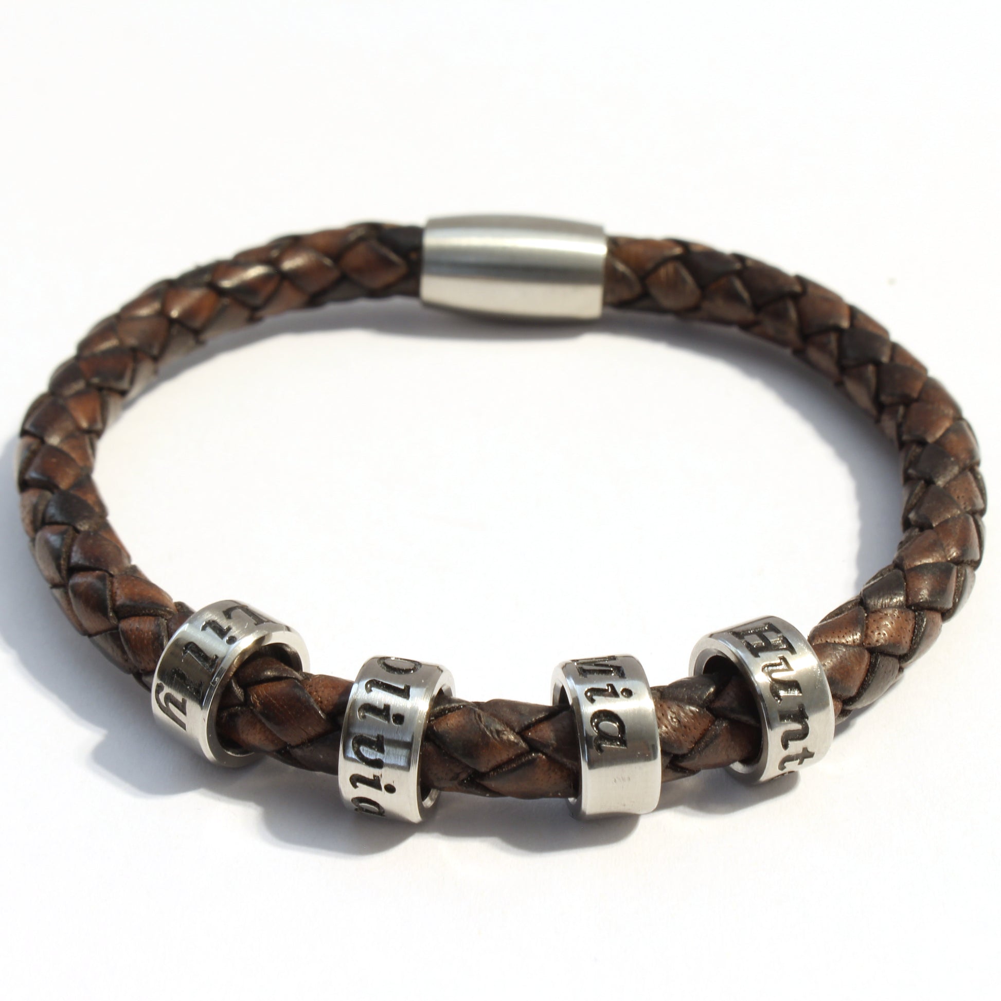 Antique Brown bolo braided leather bracelet with 4 stainless steel beads on a white background