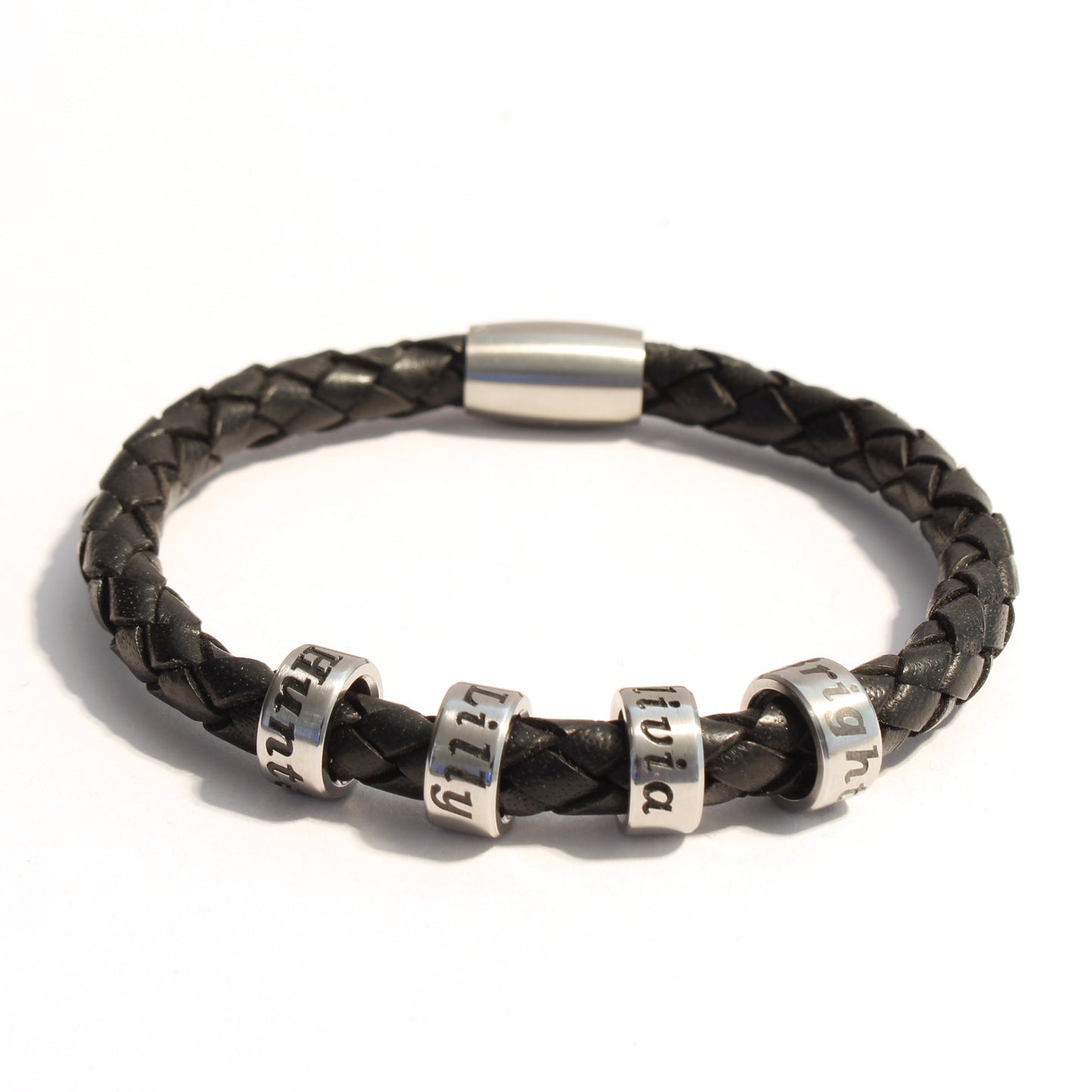 Black braided bolo leather bracelet with 4 stainless steel beads on a white background
