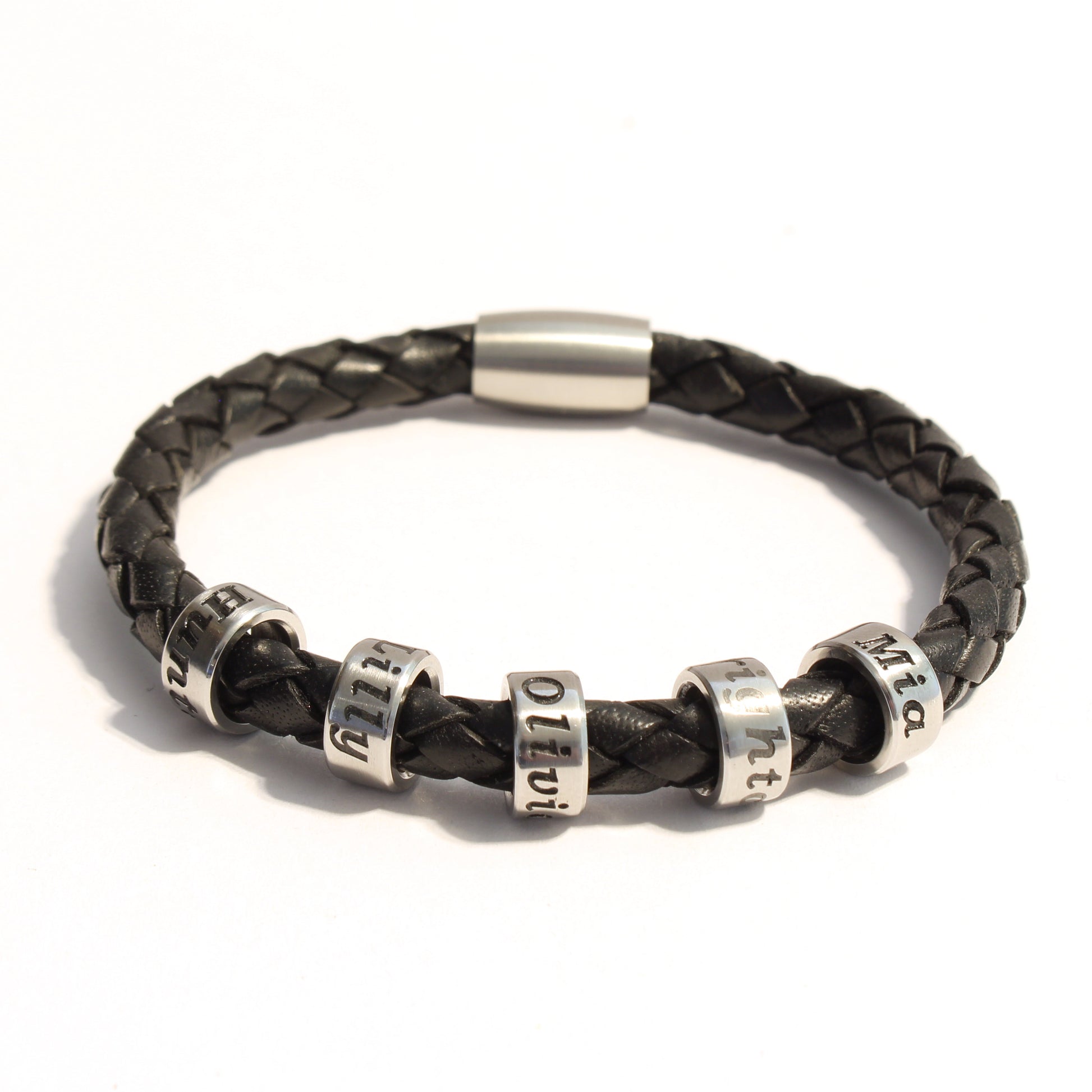 Black braided bolo leather bracelet with 5 stainless steel beads on a white background