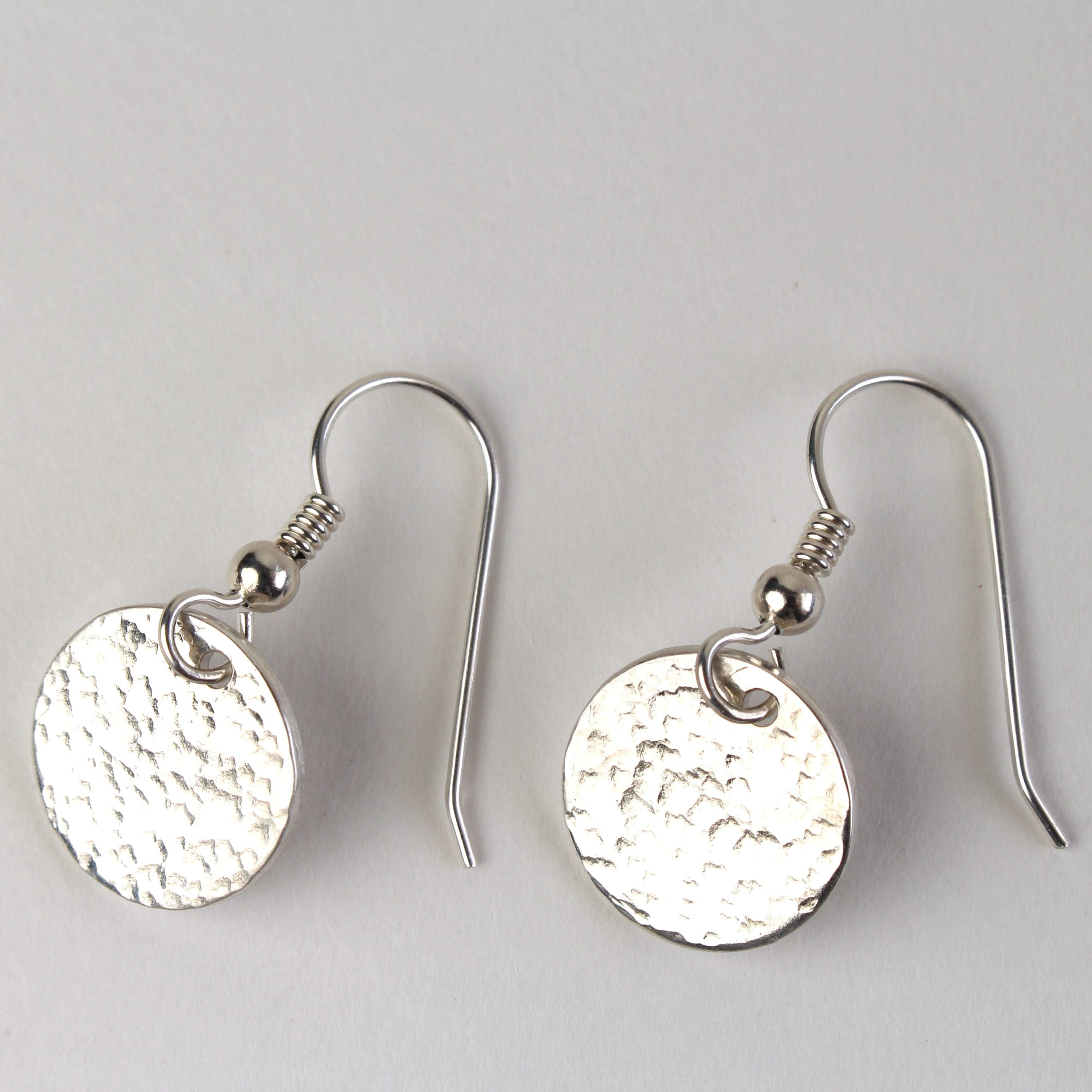 Sterling silver oxidised hammered disc hoop earrings. – Kaila jewellery