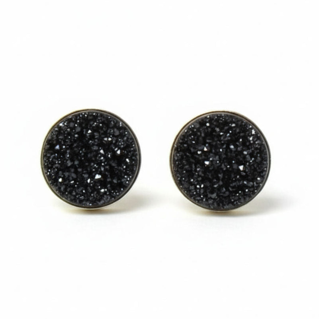 Black druzy round earrings on a white background