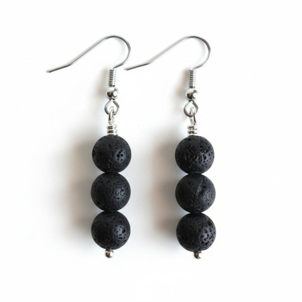Black beaded earrings on a white background