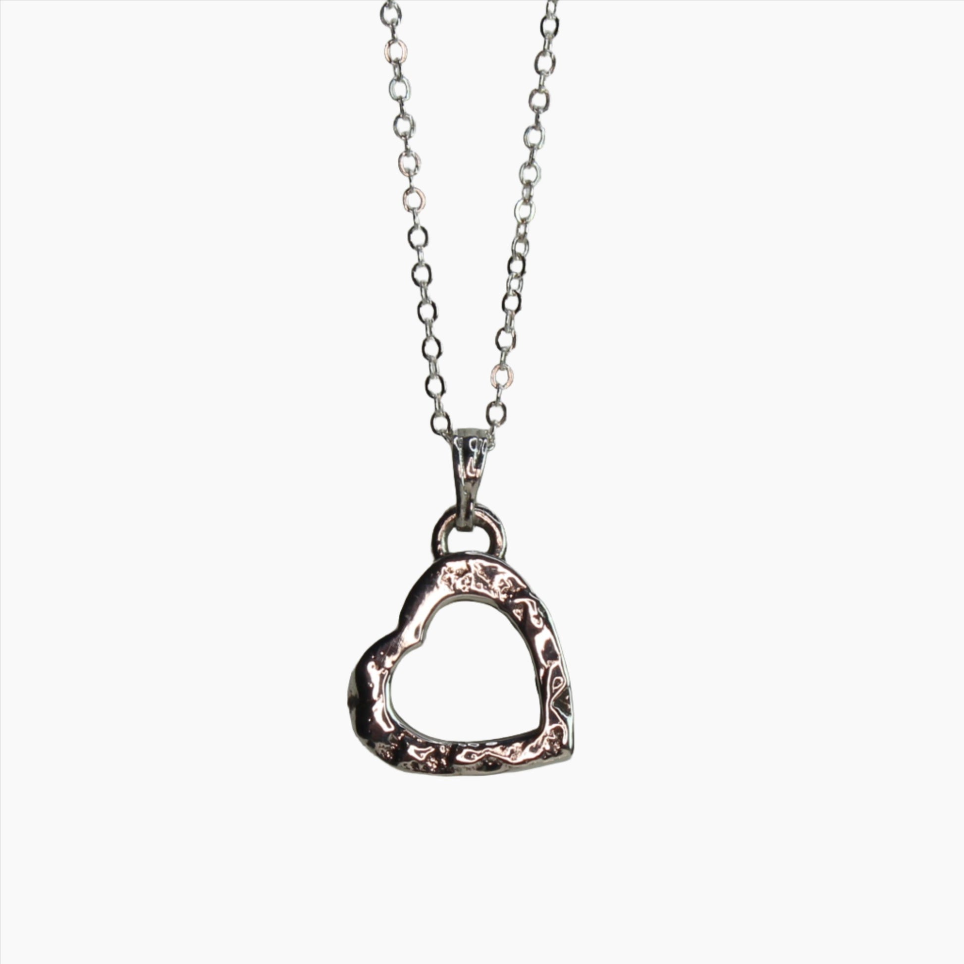petite  textured heart necklace white background